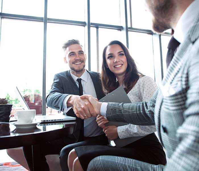 Business people shaking hands